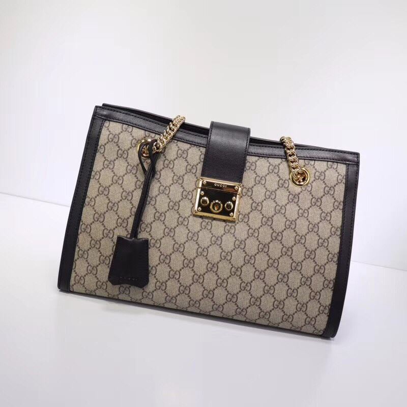 G*u*i shopping bags